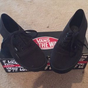 Vans tie sneakers.